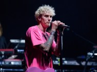 Machine Gun Kelly Hits L.A. Protests With 'Silence Is Betrayal' Sign