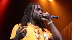 Chief Keef holding a microphone