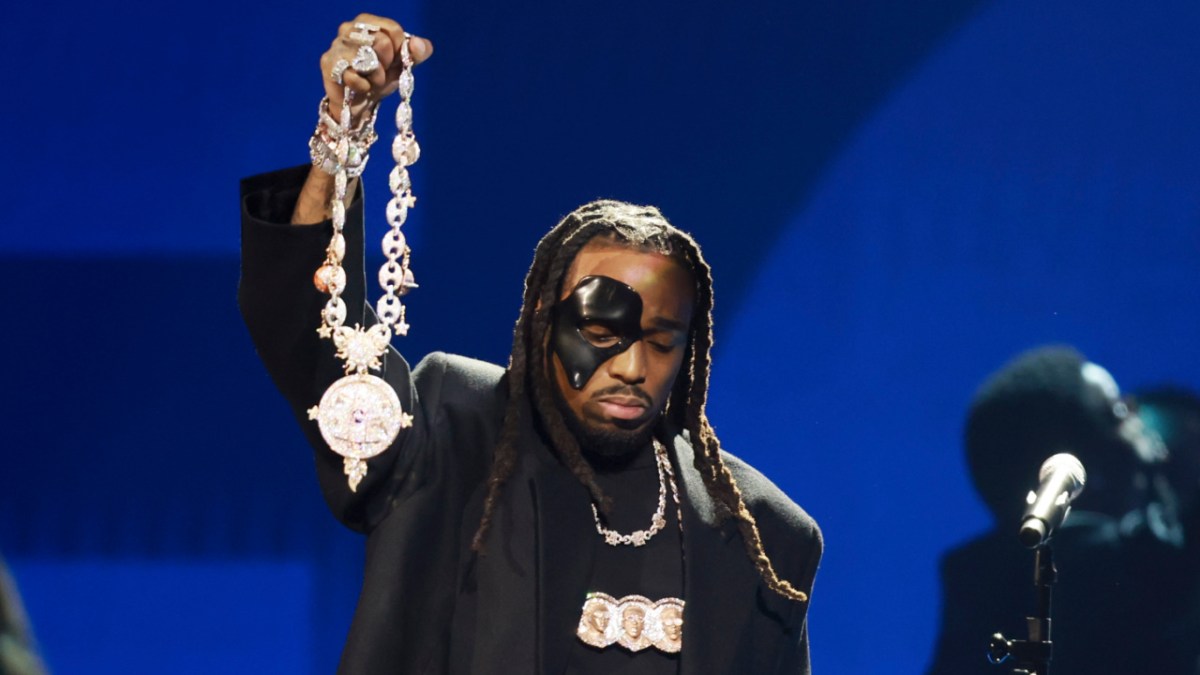 Quavo Holds Up TakeOff's Chain During Emotional Grammys Tribute