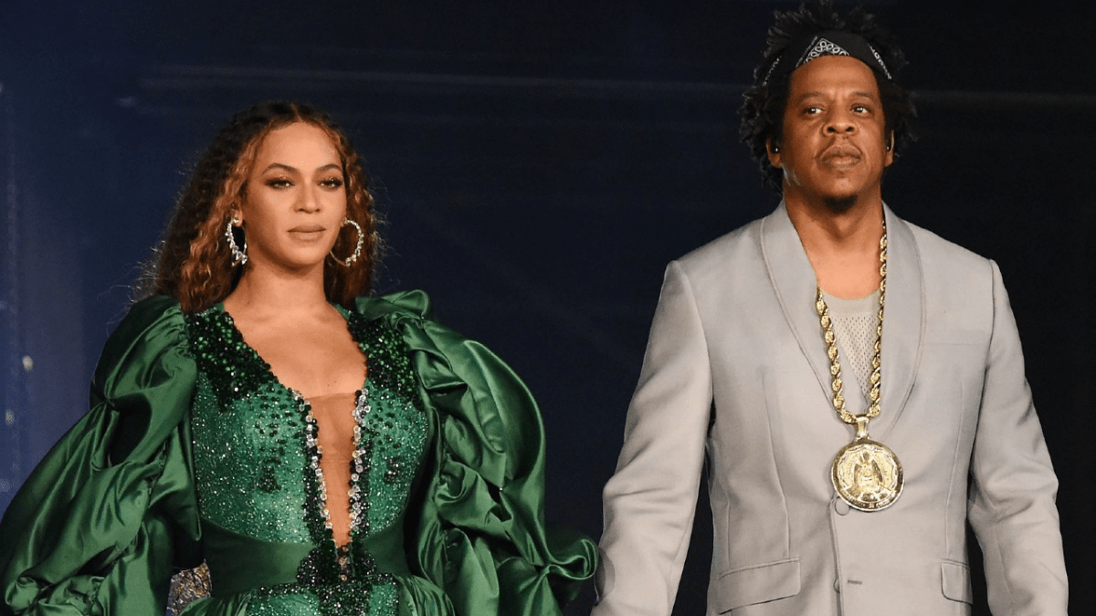 Beyoncé & JAY-Z Show Off Their Love In Oscars Gold Party Photos