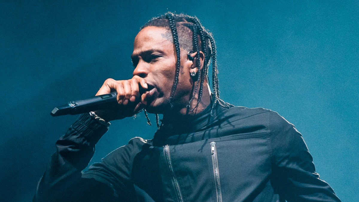 Travis Scott Almost Chokes Fan After They Storm His Stage